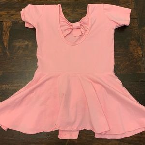 Pink onesie/leotard. Approx size 3T